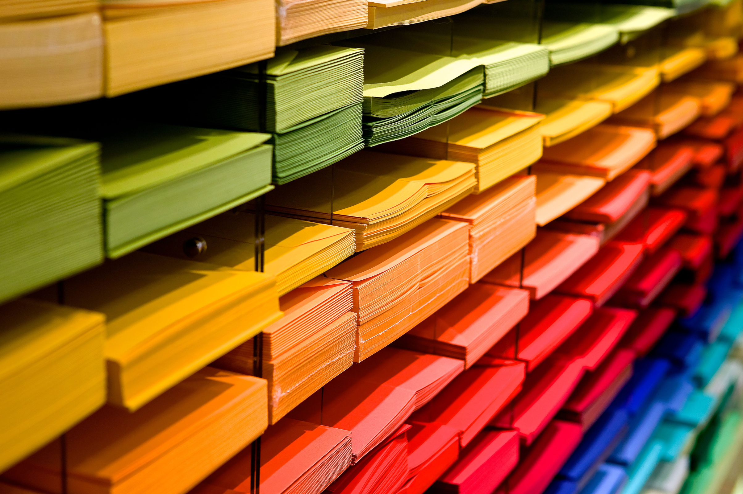 Colored Papers in a Shelf